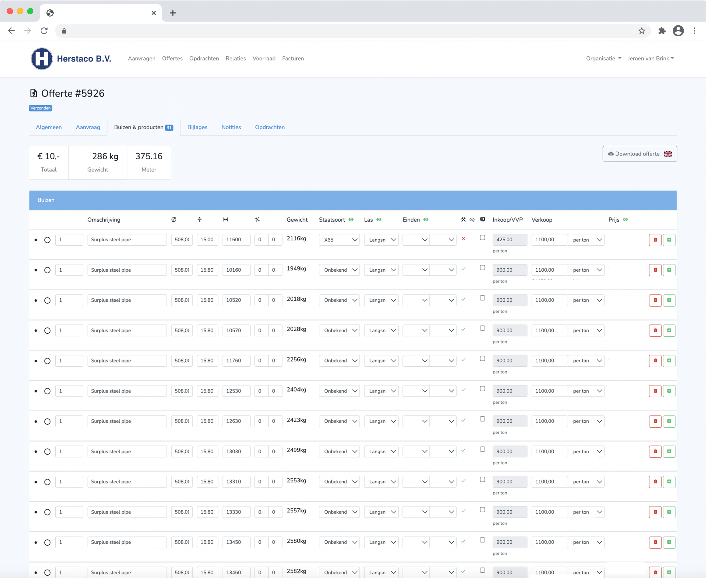 Whitney leaning against a railing on a downtown street